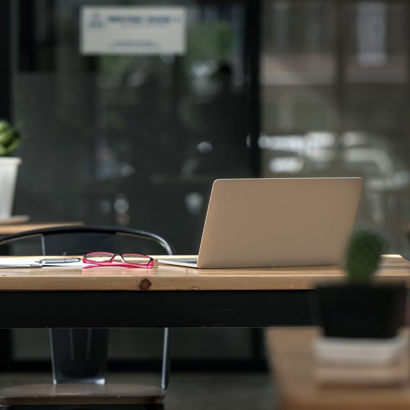 dark-tone-office-workplace-wooden-work-desk-with-laptop-documents-modern-interior-cozy-cabinet-comfortable-workspace-workplace-with-computer-home-scaled.jpg