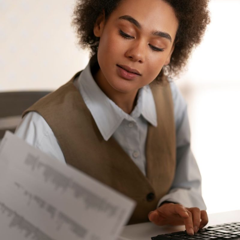 medium-shot-woman-working-as-economist.jpg